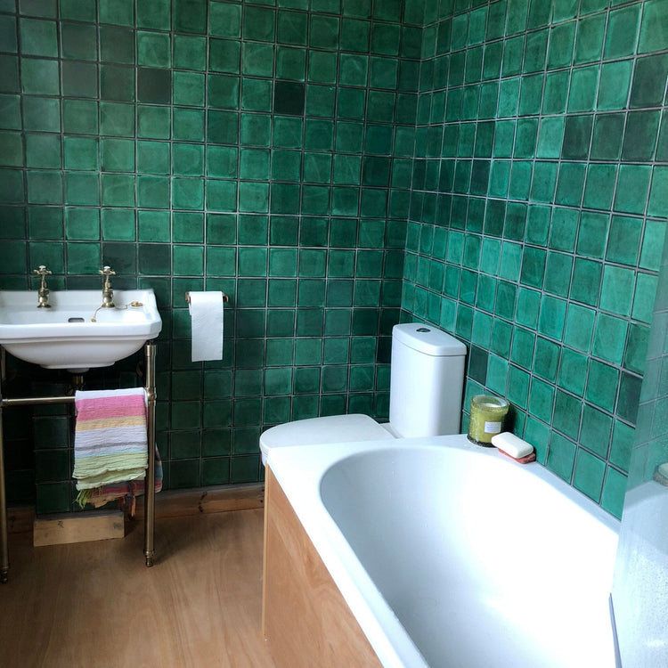 Hand-Painted Tiles for a Vibrant Bathroom